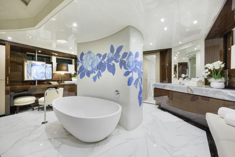 Serenity Yacht Photos Pics Luxurious Mondomarine SF40 yacht bathroom with elegant tub and floral mosaic, 2015 model.