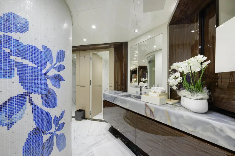 Serenity Yacht Photos Pics Luxurious Mondomarine SF40 yacht bathroom, featuring elegant decor and blue floral mosaic, 2015 model.