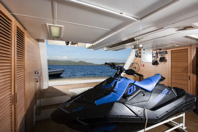 Serenity Yacht Photos Pics Jet ski on Mondomarine SF40 yacht, 2015 model, with ocean view in background.