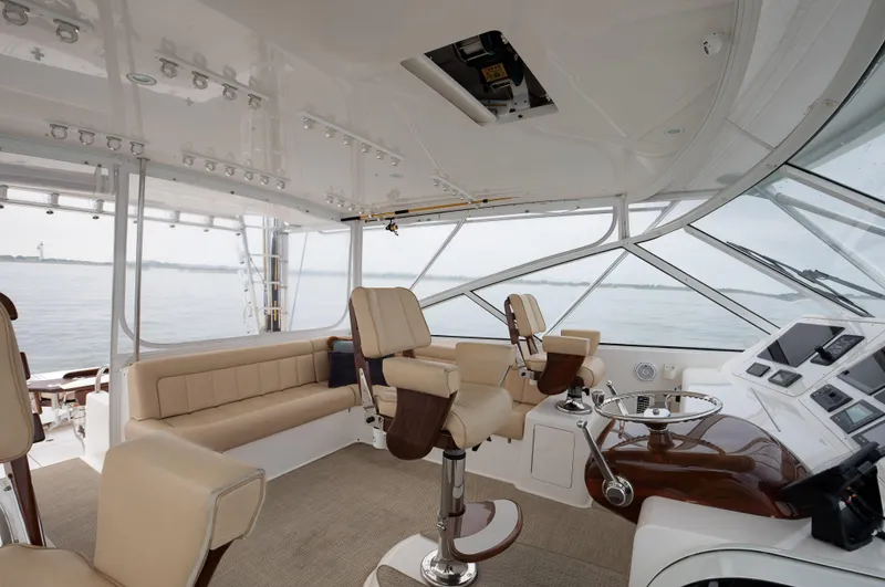 Expresso Yacht Photos Pics Luxurious interior of 2007 Viking Express yacht with helm and seating area.