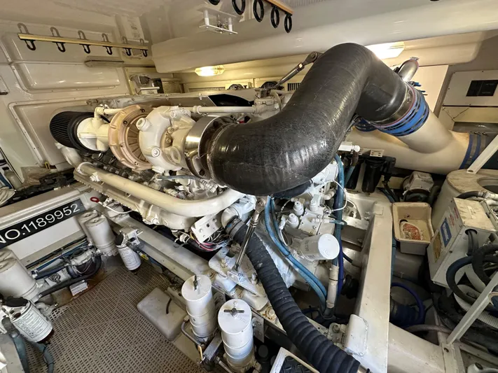 Expresso Yacht Photos Pics Engine room of a 2007 Viking Express boat, showcasing complex machinery and components.