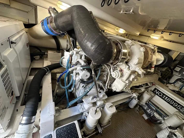 Expresso Yacht Photos Pics Engine room of a 2007 Viking Express boat, showcasing complex machinery and components.