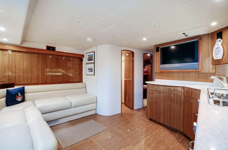 Expresso Yacht Photos Pics Luxurious 2007 Viking Express yacht interior with modern wood finishes and comfortable seating.