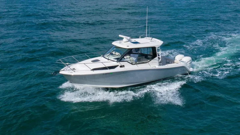  Yacht Photos Pics 2020 Boston Whaler 325 Conquest cruising on open water.