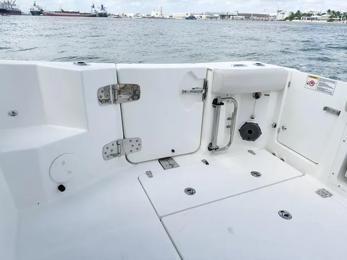  Yacht Photos Pics 2020 Boston Whaler 325 Conquest boat deck with ocean view in background.