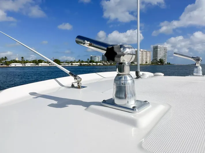 Yacht Photos Pics 2020 Boston Whaler 325 Conquest boat deck with city skyline in background.
