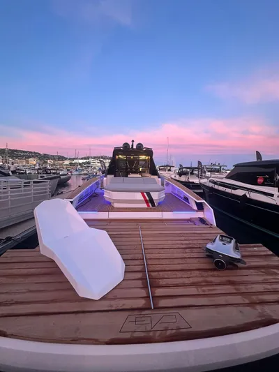  Yacht Photos Pics Evo Yachts R6+ 2025 model docked at sunset, featuring sleek design and modern amenities.