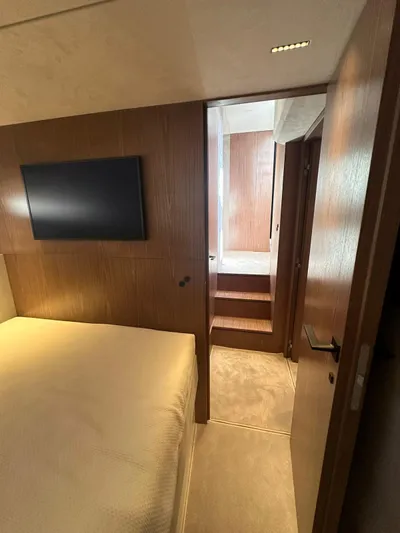  Yacht Photos Pics Luxurious Evo Yachts R6+ 2025 interior with modern bedroom and sleek wooden design.