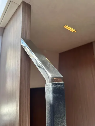  Yacht Photos Pics Interior detail of 2025 Evo Yachts R6+, featuring sleek wood and metal design elements.