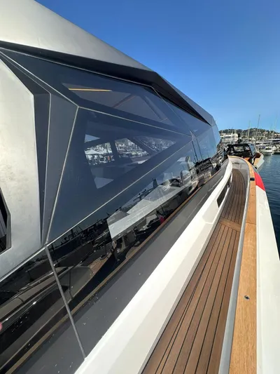  Yacht Photos Pics 2025 Evo Yachts R6+ with sleek design and modern windows, docked at a marina.