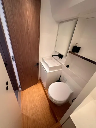  Yacht Photos Pics Modern bathroom on 2025 Evo Yachts R6+, featuring sleek design and compact functionality.