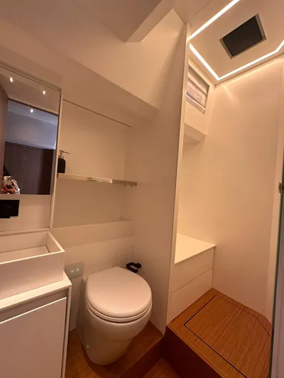  Yacht Photos Pics Modern bathroom in 2025 Evo Yachts R6+, featuring sleek design and efficient use of space.