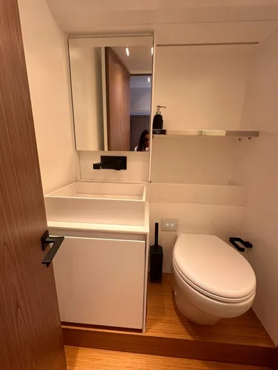  Yacht Photos Pics Modern bathroom in 2025 Evo Yachts R6+, featuring sleek design and compact fixtures.