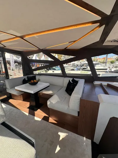  Yacht Photos Pics Luxurious interior of 2025 Evo Yachts R6+, featuring modern seating and elegant design.
