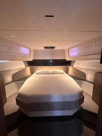  Yacht Photos Pics Luxurious 2025 Evo Yachts R6+ cabin interior with modern design and ambient lighting.