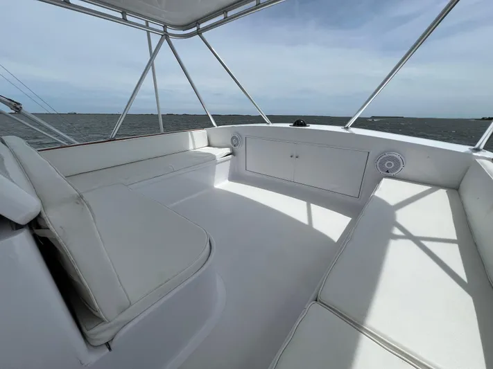 Pre Sail Yacht Photos Pics Interior of 2000 Blackwell Carolina Custom boat with white seating and ocean view.
