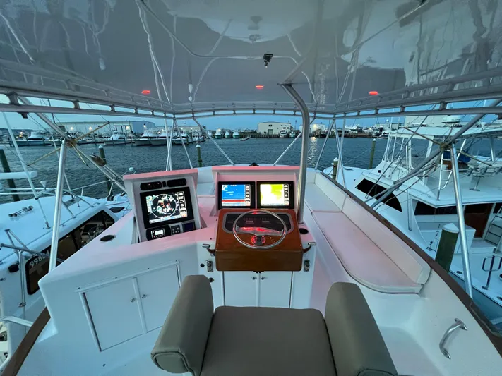 Pre Sail Yacht Photos Pics Helm of 2000 Blackwell Carolina Custom boat with navigation screens and steering wheel.