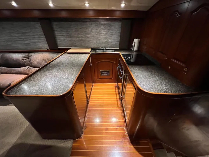 Pre Sail Yacht Photos Pics Luxurious kitchen area in a 2000 Blackwell Carolina Custom yacht with granite countertops.