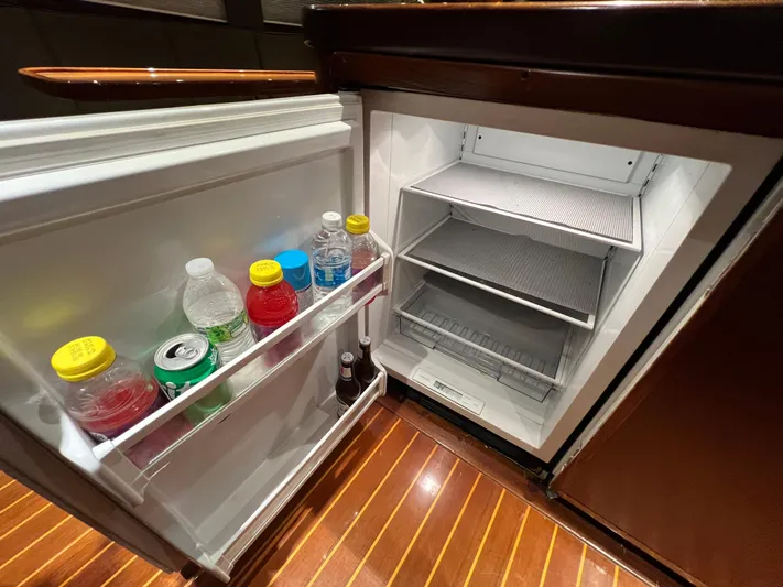 Pre Sail Yacht Photos Pics Open mini fridge in 2000 Blackwell Carolina Custom boat with drinks inside.