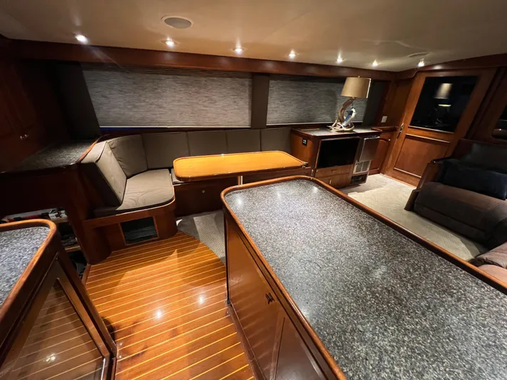 Pre Sail Yacht Photos Pics Luxurious interior of a 2000 Blackwell Carolina Custom yacht with wood finishes and modern lighting.
