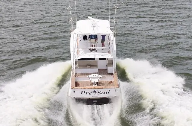 Pre Sail Yacht Photos Pics 2000 Blackwell Carolina Custom boat cruising on the water, rear view.