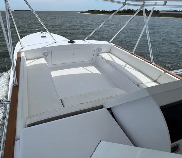 Pre Sail Yacht Photos Pics 2000 Blackwell Carolina Custom boat with spacious white seating area on the water.