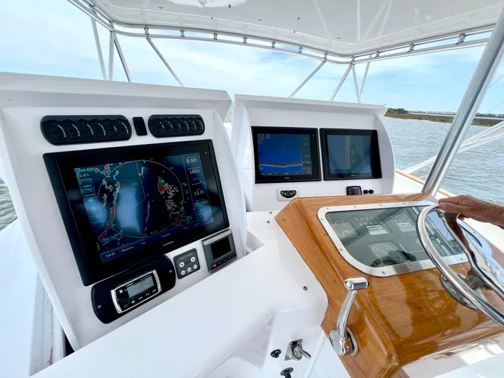 Pre Sail Yacht Photos Pics Control panel of a 2000 Blackwell Carolina Custom boat with navigation screens.