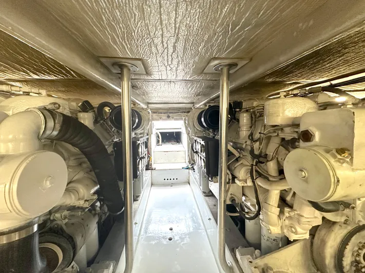Pre Sail Yacht Photos Pics Engine room of 2000 Blackwell Carolina Custom boat, showcasing dual engines and mechanical components.
