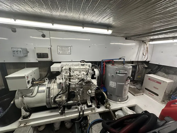 Pre Sail Yacht Photos Pics Engine room of a 2000 Blackwell Carolina Custom boat, featuring machinery and equipment.