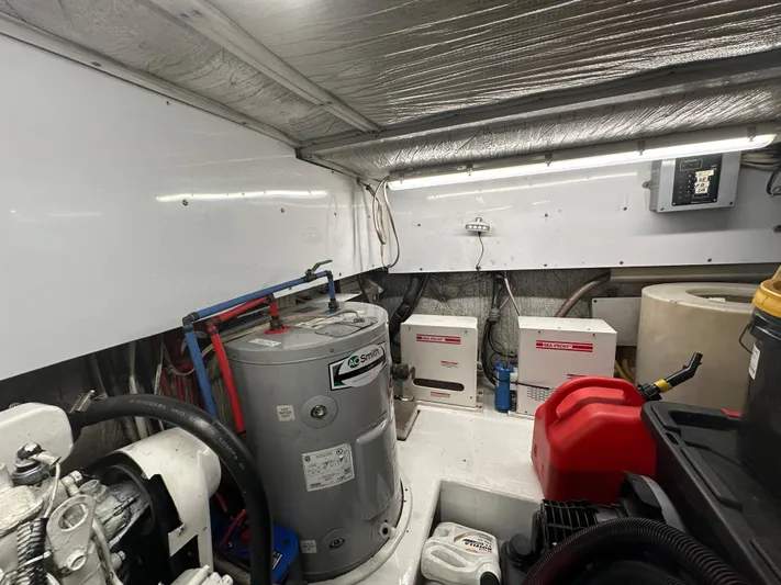 Pre Sail Yacht Photos Pics Engine room of 2000 Blackwell Carolina Custom boat with equipment and storage tanks.