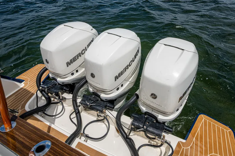 Yes Day Yacht Photos Pics 2021 Hinckley Sport Boat 40 X with triple Mercury outboard engines on water.