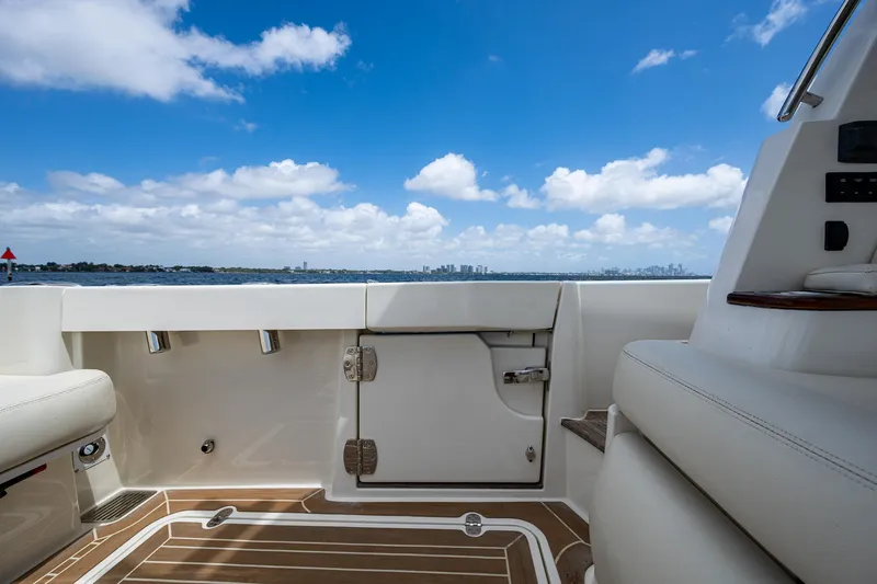 Yes Day Yacht Photos Pics 2021 Hinckley Sport Boat 40 X deck with ocean view and blue sky.