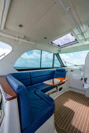Yes Day Yacht Photos Pics Interior of 2021 Hinckley Sport Boat 40 X with blue seating and ocean view.