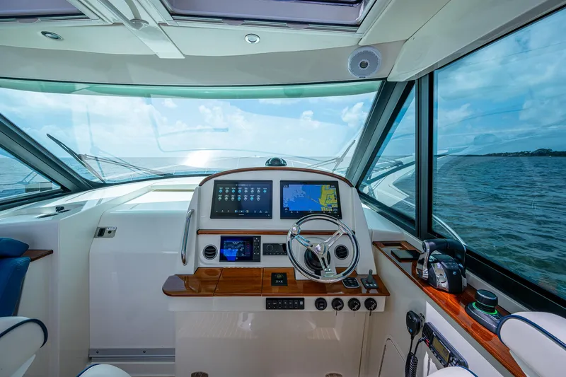 Yes Day Yacht Photos Pics Interior view of 2021 Hinckley Sport Boat 40 X helm with navigation screens.