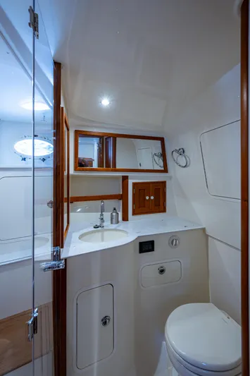Yes Day Yacht Photos Pics 2021 Hinckley Sport Boat 40 X bathroom with modern fixtures and wooden accents.