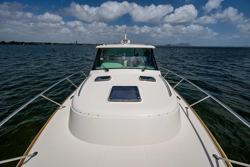 Yes Day Yacht Photos Pics 2021 Hinckley Sport Boat 40 X on open water under a partly cloudy sky.