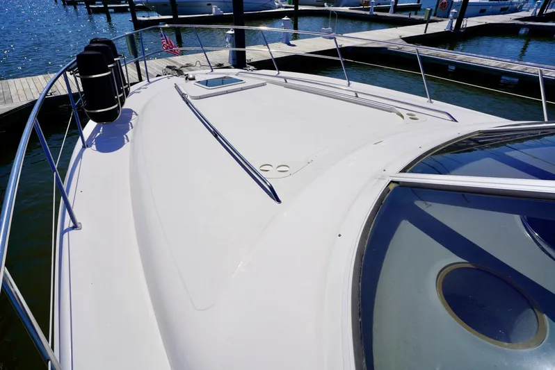 Cheaper II Keep Her Yacht Photos Pics 2002 Sea Ray 480 Sedan Bridge yacht bow view at marina.