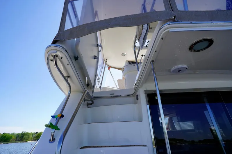 Cheaper II Keep Her Yacht Photos Pics 2002 Sea Ray 480 Sedan Bridge, view of the stairs and upper deck.