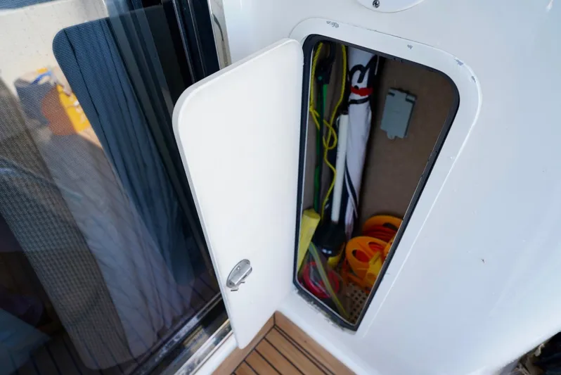 Cheaper II Keep Her Yacht Photos Pics Storage compartment on a 2002 Sea Ray 480 Sedan Bridge yacht.