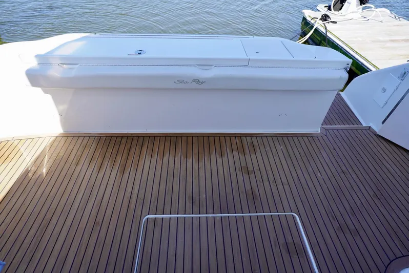 Cheaper II Keep Her Yacht Photos Pics Teak deck of 2002 Sea Ray 480 Sedan Bridge yacht at dock.