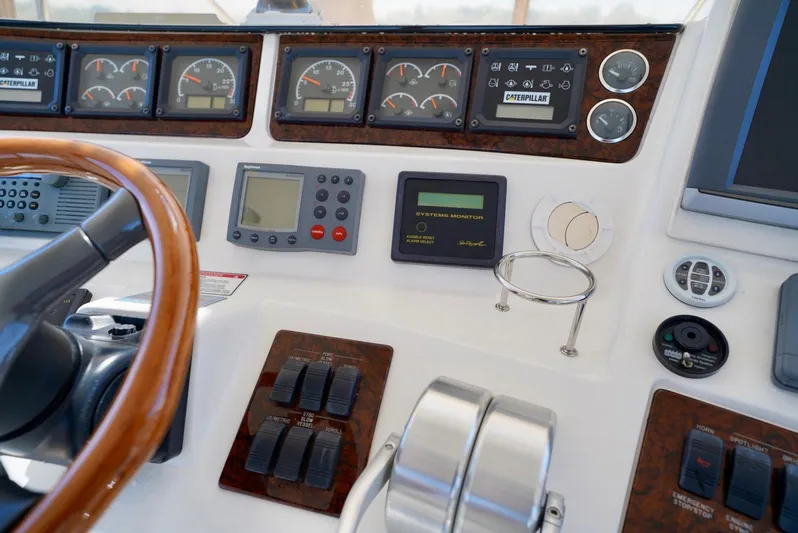 Cheaper II Keep Her Yacht Photos Pics Control panel of a 2002 Sea Ray 480 Sedan Bridge yacht.