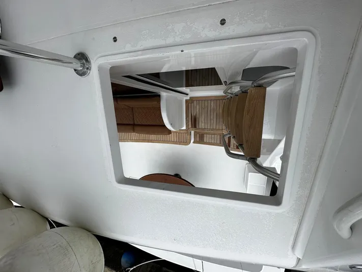  Yacht Photos Pics Hatch view of 2003 Viking 52 yacht interior with wooden flooring.