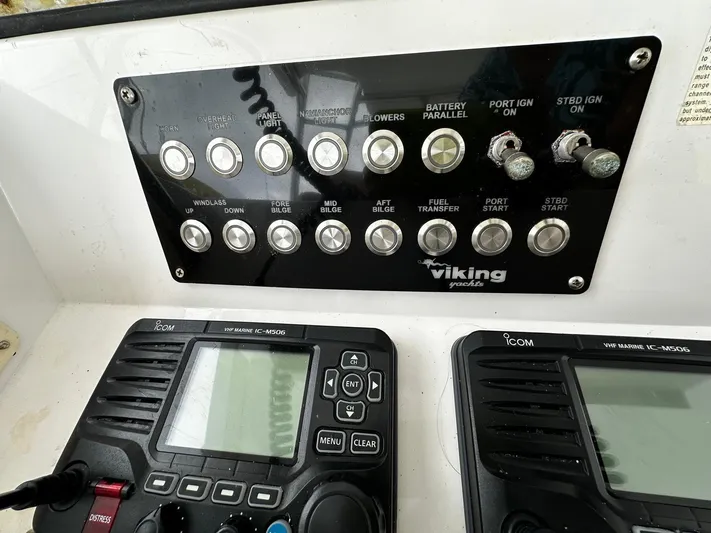  Yacht Photos Pics Control panel of a 2003 Viking 52 boat with ICOM marine radios.