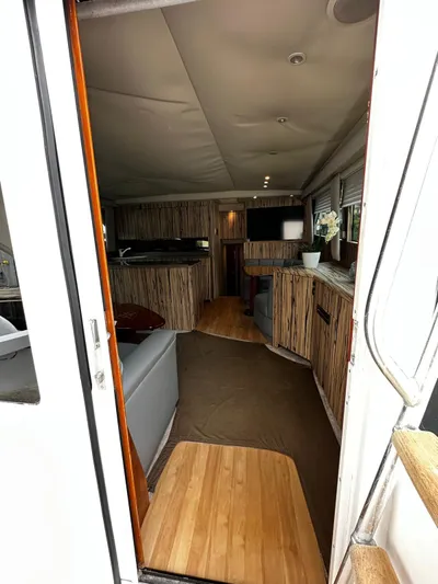  Yacht Photos Pics Interior view of 2003 Viking 52 yacht, featuring modern design and comfortable seating.