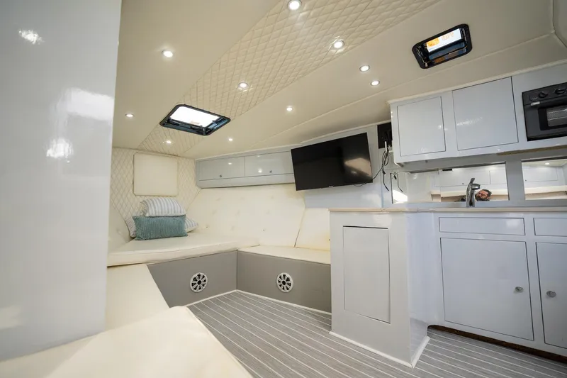 It Is Well Yacht Photos Pics Luxurious interior of a 1997 Strike 42 Express yacht with modern amenities.