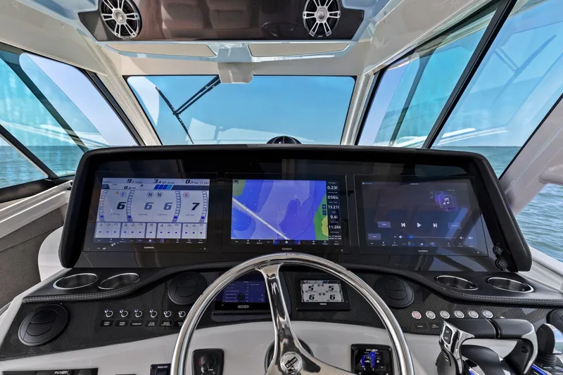  Yacht Photos Pics 2023 Grady-White Canyon 456 helm with advanced navigation and control systems.