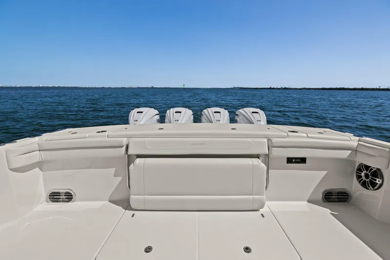  Yacht Photos Pics 2023 Grady-White Canyon 456 boat deck with ocean view and four engines.