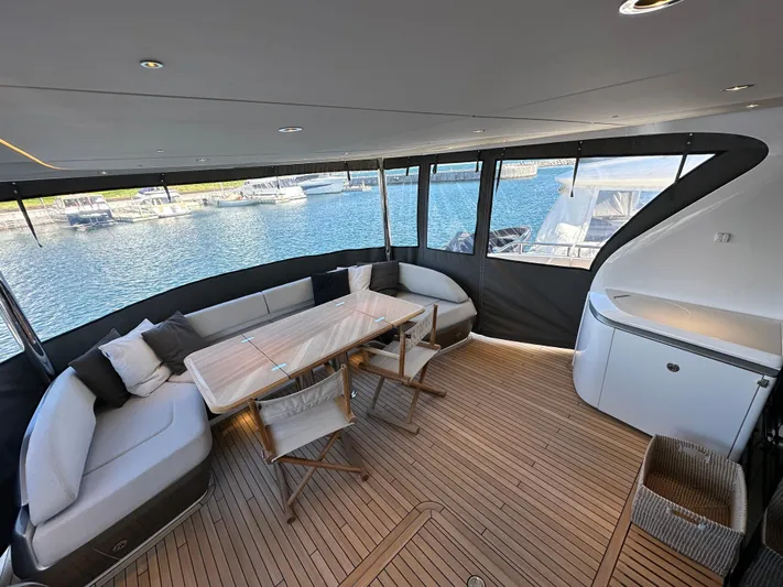  Yacht Photos Pics Luxurious 2025 Princess Y80 yacht interior with elegant seating and dining area.