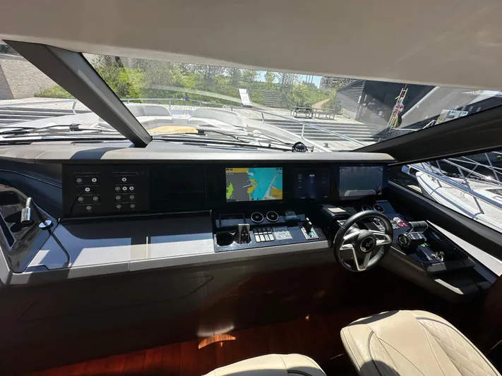  Yacht Photos Pics Interior cockpit of 2025 Princess Y80 yacht with modern navigation system and controls.