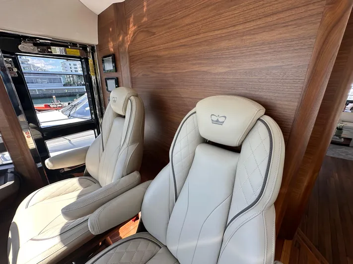 Yacht Photos Pics Luxurious interior of 2025 Princess Y80 yacht with plush leather seating.